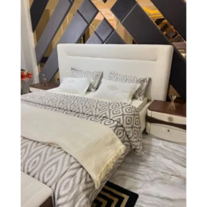 Classic Elegance White Leather-Rite Bed with Geometric Backdrop - Image 2