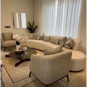 Minimalist Crescent Grey Sofa with Dark Wood Base - Image 3